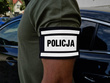 Odblaskowa opaska szybkiego rozpoznania nadruk POLICJA - czarna